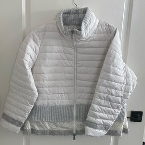 NWT Bev is a fitted down-filled lightweight puffer designed for everyday wear.